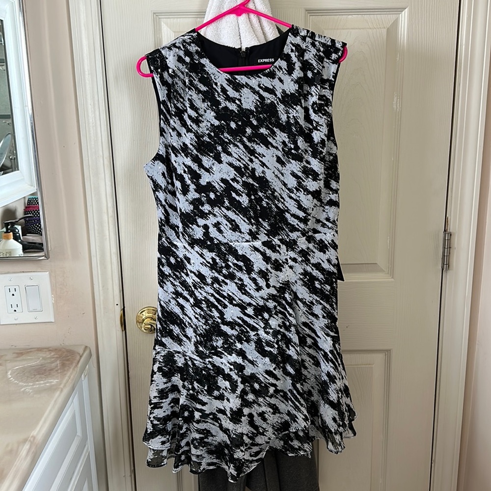 Express black and white dress with gold accents
